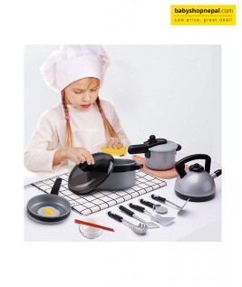 A Child Playing with Kitchen Set.